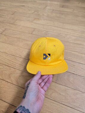 Converse | Cons Star embroidered logo yellow canvas flat brim hat